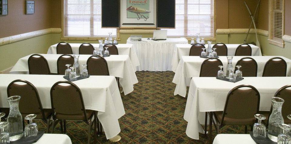 Meeting Room with small rectangular tables facing the front