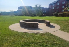The outdoor courtyard on a green lawn.